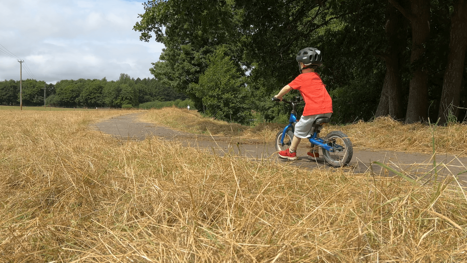 A child riding a balance bike